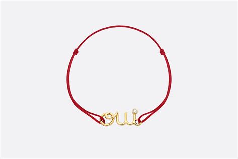 Bracciale Dioramour Oro giallo, diamante e corda rossa .